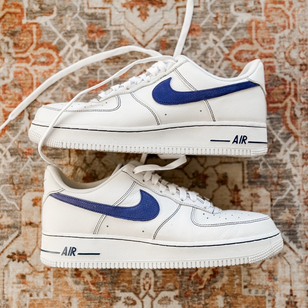 Nike White Leather Sneakers with Blue Swoosh
